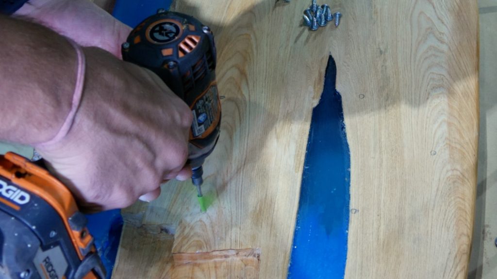 how to make wood and resin wall art that glows_drill pilot holes for hairpin legs