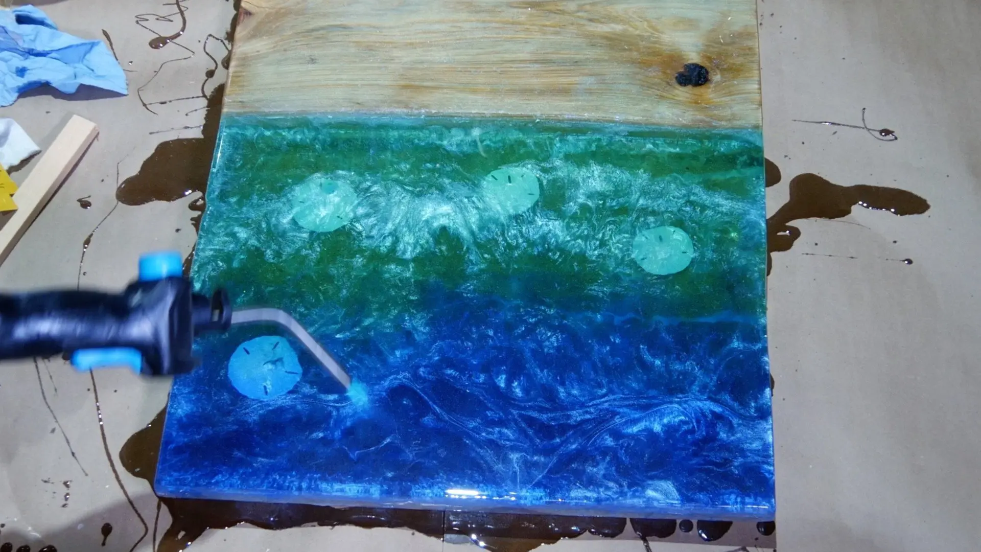 DIY Wood and Resin Beach Art with Real Sand_flood coat remove air pockets
