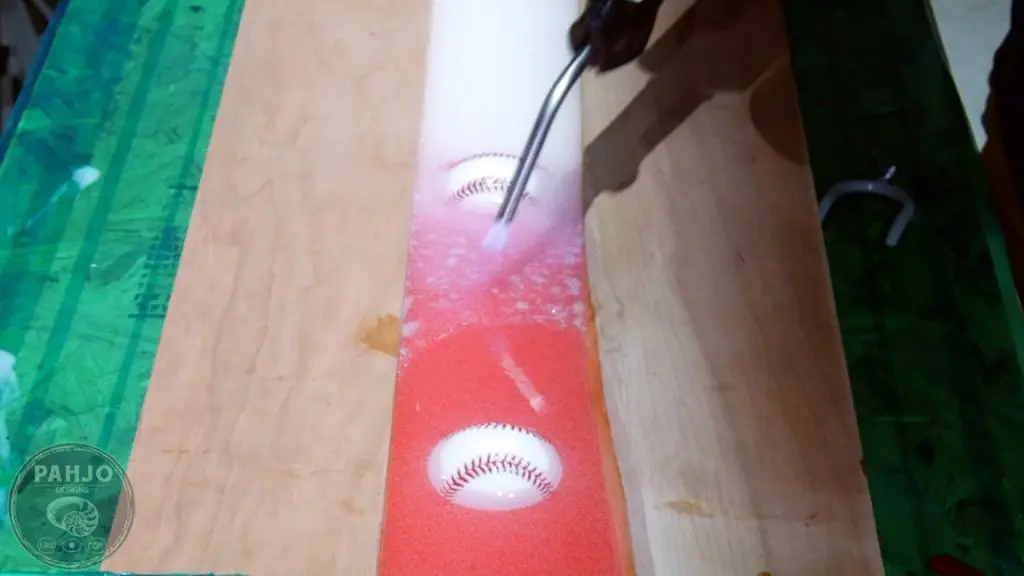 DIY Wood and Resin Wall Art - Baseball Storage Rack_Remove Bubbles