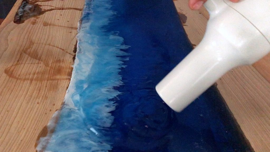 resin ocean wave art using alcohol ink and heat gun