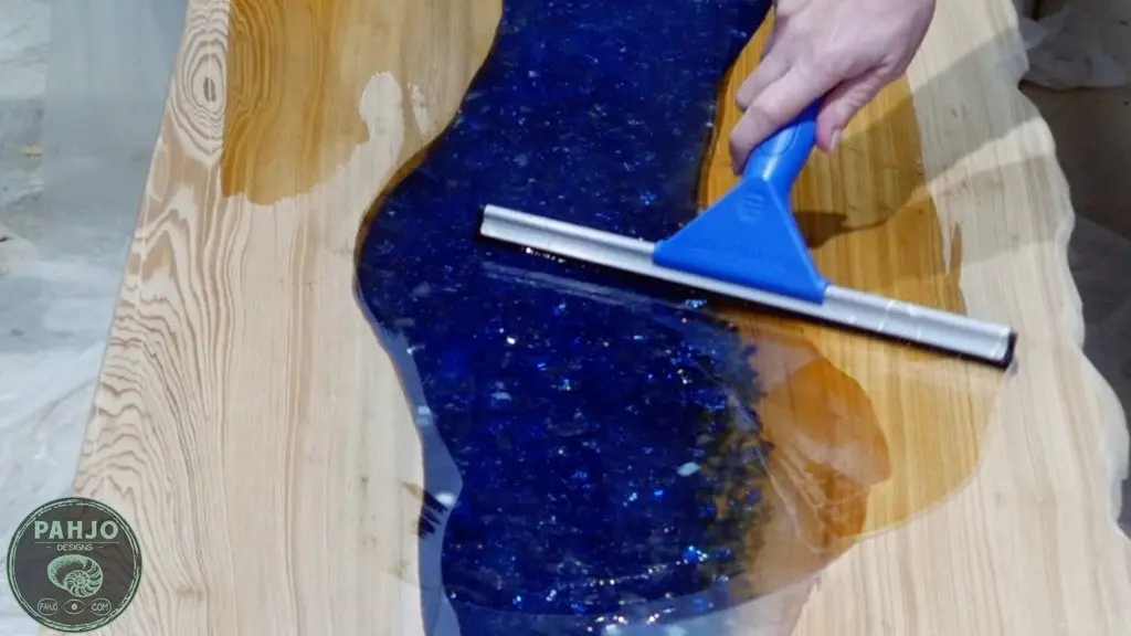 spread epoxy with rubber squeegee
