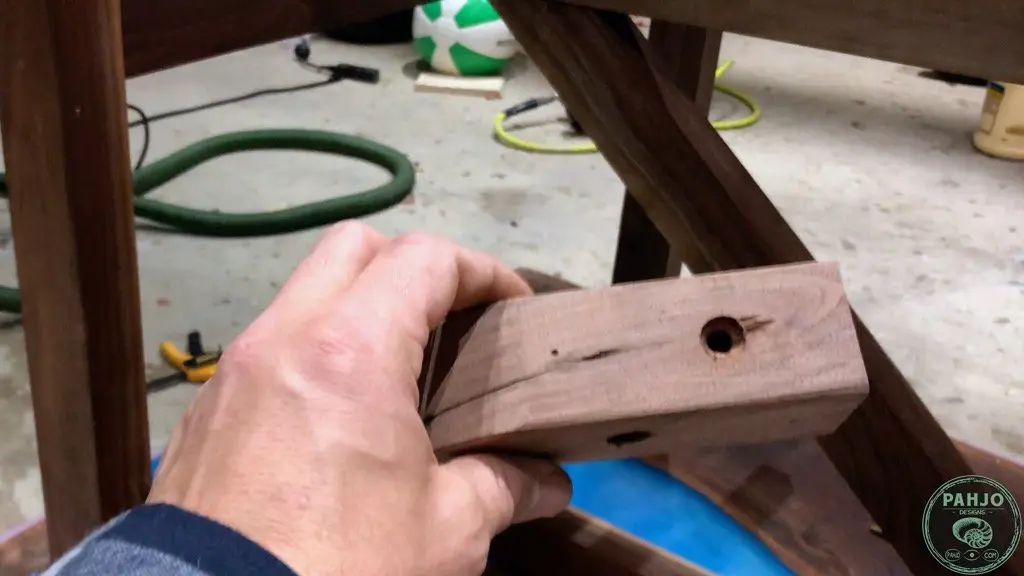 attaching table top to trestle base using wood blocks