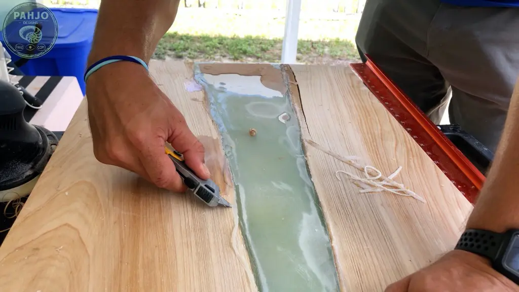 remove caulk from epoxy ocean table mould