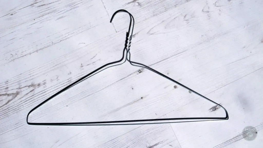 wire coat hanger to unclog drain