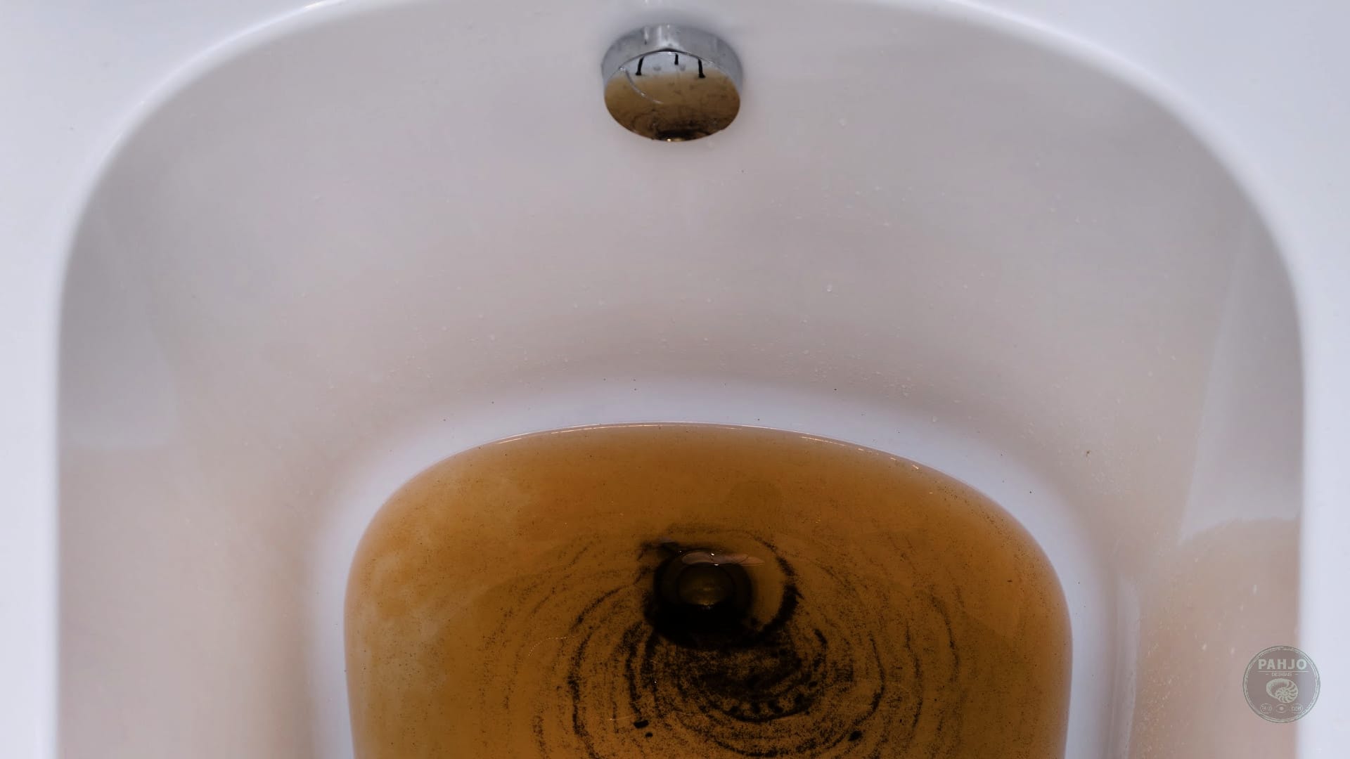 How to Unclog a Tub Drain with Standing Water 