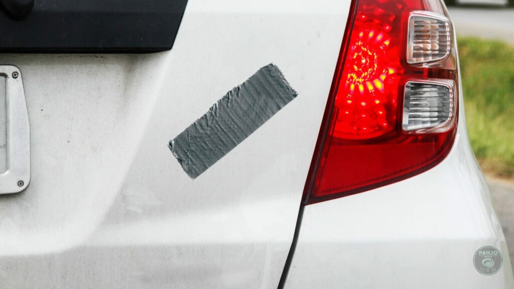 how to remove tape residue from car without damaging paint
